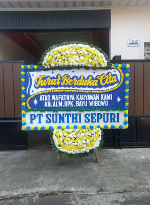 Papan Bunga Duka di Jurang